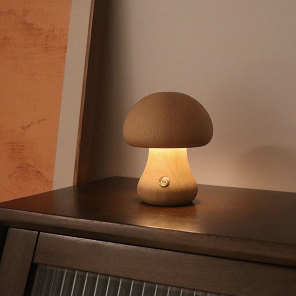 Bordslampa i bok med justerbar ljusstyrka och champinjondesign